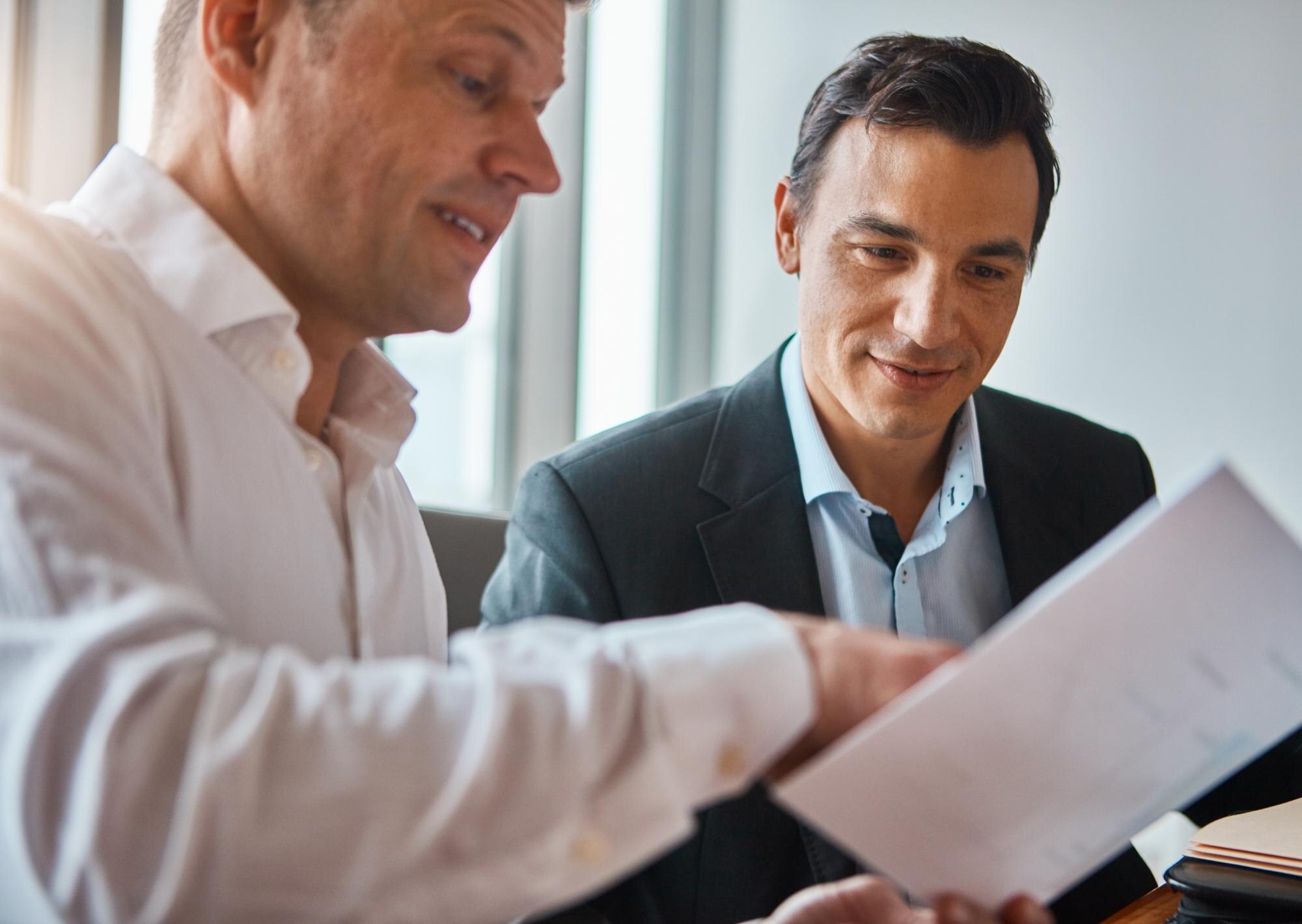 office business people document reading agreement corporate proposal with discussion professional ca